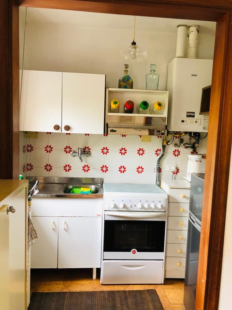 Kitchen or kitchenette, oven, stove