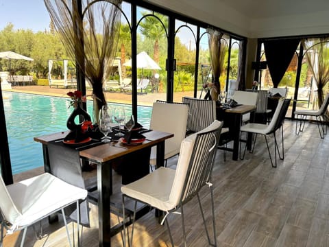 Patio, Dining area, Pool view