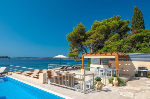 Property building, Day, Natural landscape, Beach, Pool view, Sea view, Swimming pool, sunbed