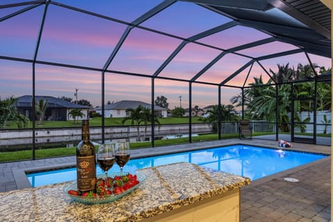 Tranquil Canal Views, Saltwater Pool - Modern Retreat on the 21st - Roelens House in Cape Coral