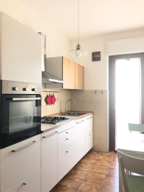 Kitchen or kitchenette, oven, stove