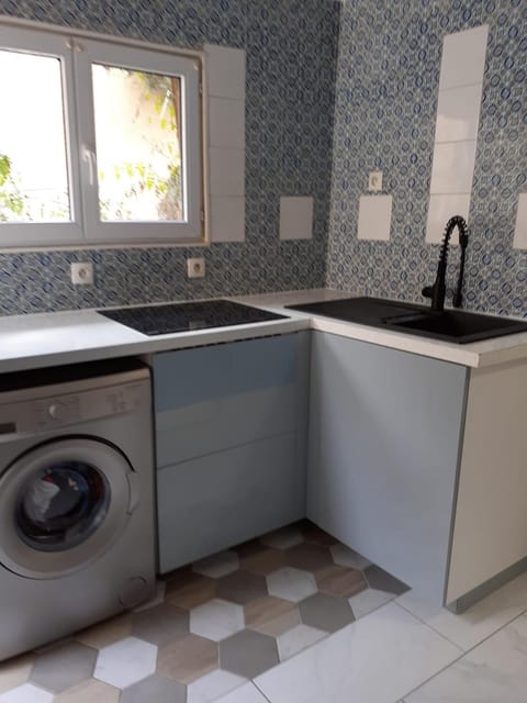 Kitchen or kitchenette, dishwasher, washing machine, dryer