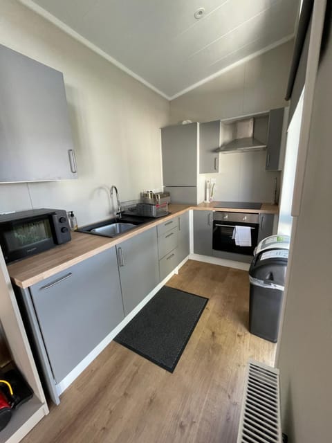 Kitchen or kitchenette, oven, stove