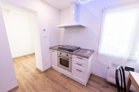 Kitchen or kitchenette, oven, stove