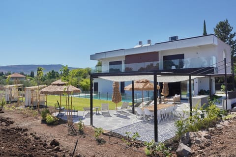 Property building, Patio, Spring, Natural landscape, Garden view, Mountain view, Pool view, Swimming pool