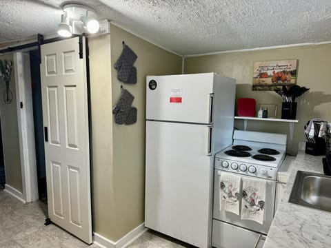 Kitchen or kitchenette, oven, stove