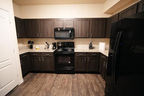 Kitchen or kitchenette, oven, stove