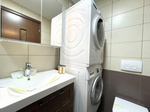 Bathroom, towels, washing machine, dryer