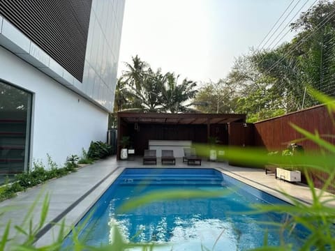 Property building, Pool view, Swimming pool, sunbed