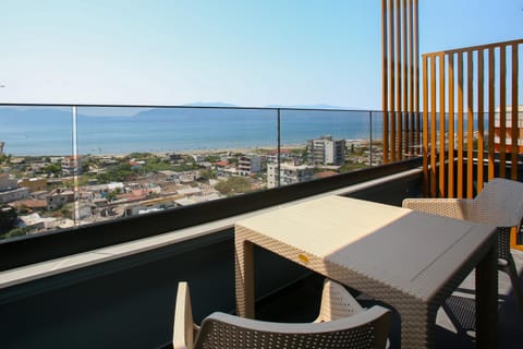 Patio, Day, Natural landscape, View (from property/room), Balcony/Terrace, Living room, Seating area, Dining area, City view, Sea view