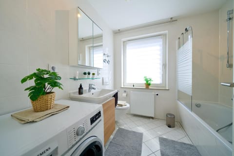 Bathroom, Kitchen or kitchenette, Bath, dishwasher, towels, washing machine, dryer