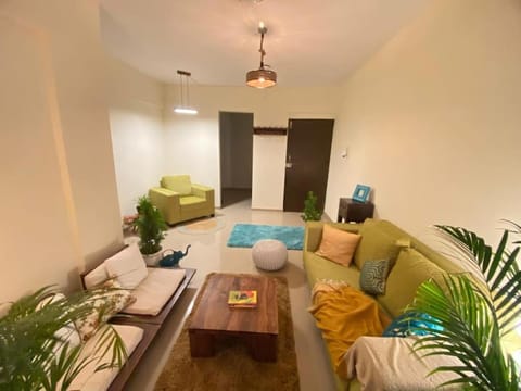 Slow living at bohemian Blue Door Home near Atal Setu Apartment in Mumbai