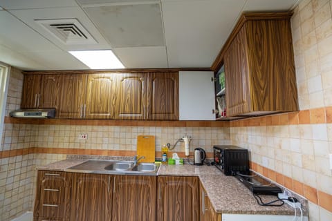 Kitchen or kitchenette, oven, stove