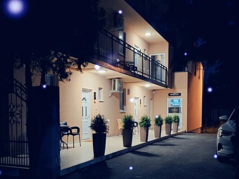 Property building, Patio, Night, Balcony/Terrace, Parking