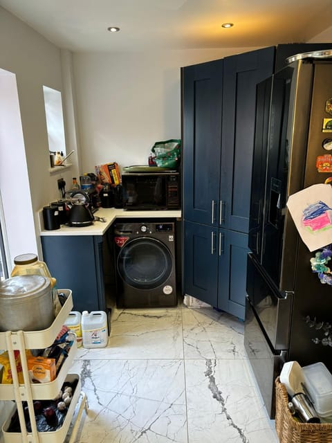 Kitchen or kitchenette, washing machine