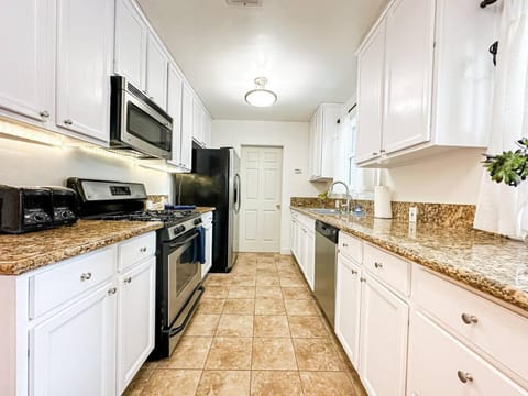 Kitchen or kitchenette, dishwasher, microwave, oven, pet friendly, stove, toaster