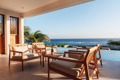 Balcony/Terrace, Seating area, Pool view, Sea view, Swimming pool