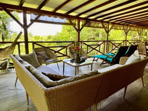 Patio, Day, Garden, View (from property/room), Balcony/Terrace, Living room, Seating area, Garden view, Sea view