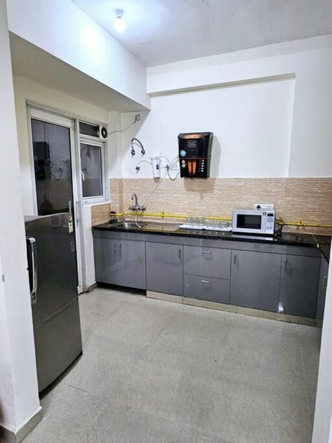 Kitchen or kitchenette, oven, stove