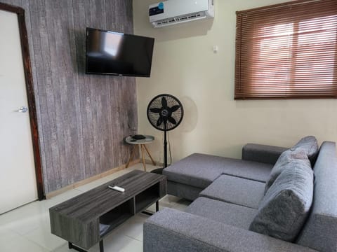 Communal lounge/ TV room, Living room, Seating area, air conditioner