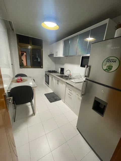 Kitchen or kitchenette, oven, stove