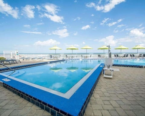 Have family fun in the sun at Daytona Beach in this resort 2BD condo House in Daytona Beach Shores