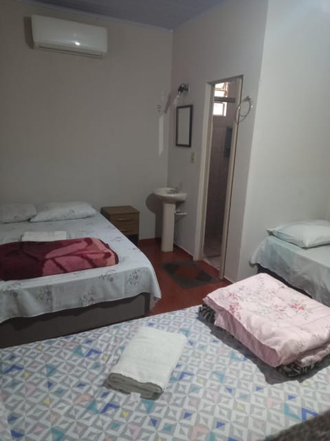 Bed, Bathroom, Photo of the whole room, Bedroom, towels, air conditioner