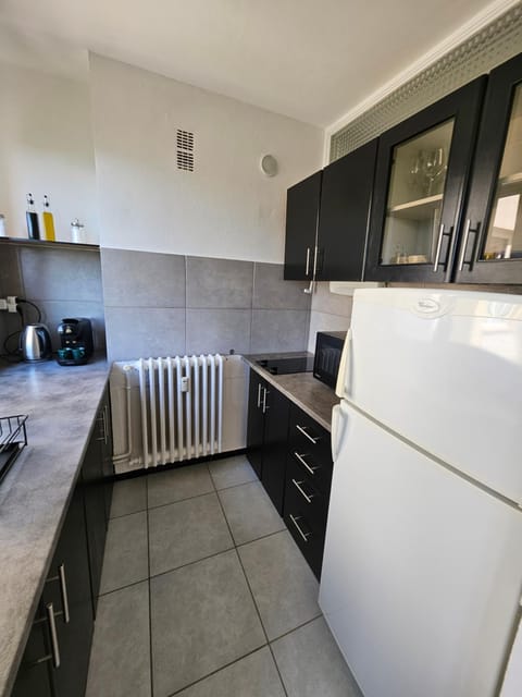 Kitchen or kitchenette, oven, stove