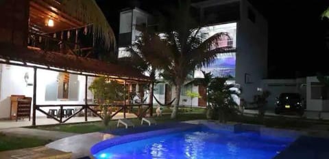 Property building, Patio, Night, Evening entertainment, Pool view