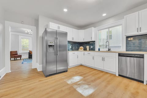 Kitchen or kitchenette, dishwasher, oven, stove