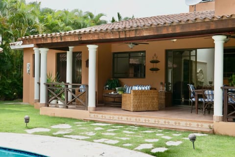 Property building, Patio, Day, Garden, Living room, Seating area, Dining area, Garden view, Pool view, Swimming pool, sunbed