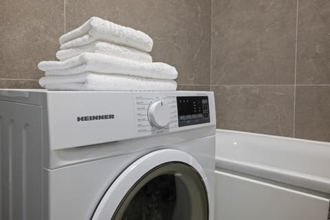 Bathroom, towels, washing machine