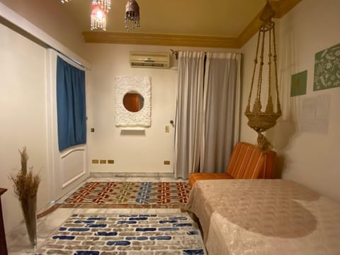 Bed, Photo of the whole room, Decorative detail, Bedroom, air conditioner