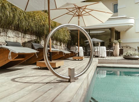 Patio, Day, Natural landscape, Pool view, Swimming pool, sunbed