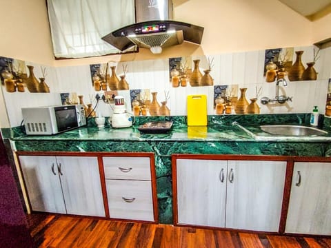 Kitchen or kitchenette, stove