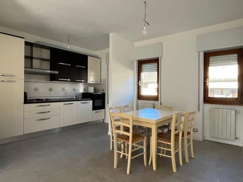 Dining area, stove, kitchen