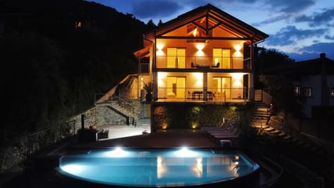 Property building, Patio, Night, Garden view, Pool view, Swimming pool