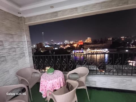 Night, View (from property/room), Balcony/Terrace, Seating area, City view