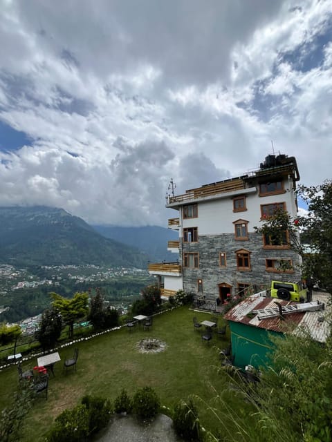 Property building, Spring, Day, Natural landscape, Mountain view