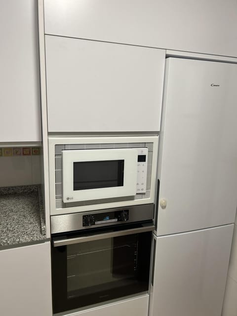 Kitchen or kitchenette, oven