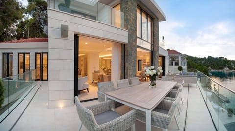 Balcony/Terrace, Seating area, Beach, Sea view, Swimming pool