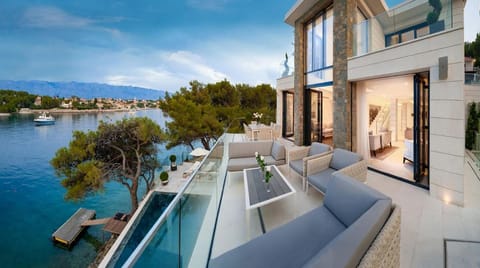 Balcony/Terrace, Seating area, Beach, Sea view, Swimming pool