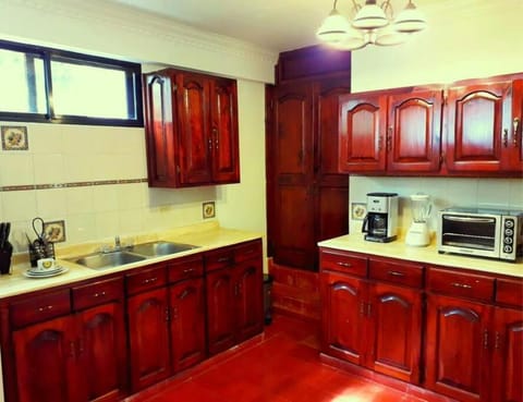 Kitchen or kitchenette, oven, stove, toaster