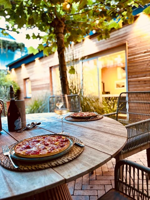 Property building, Patio, Dining area, Garden view