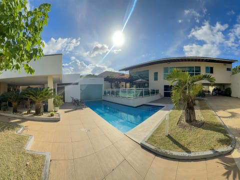 Property building, Day, Pool view, Swimming pool, sunbed