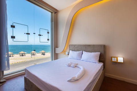 Bed, Natural landscape, View (from property/room), Bedroom, Sea view, towels