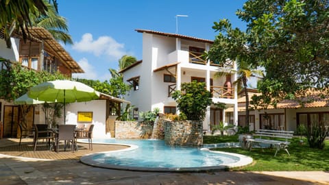 Property building, Patio, Garden, Swimming pool