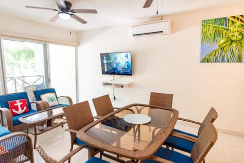 TV and multimedia, Living room, Seating area, Dining area, Pool view, air conditioner