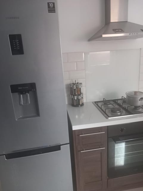 Kitchen or kitchenette, oven, stove