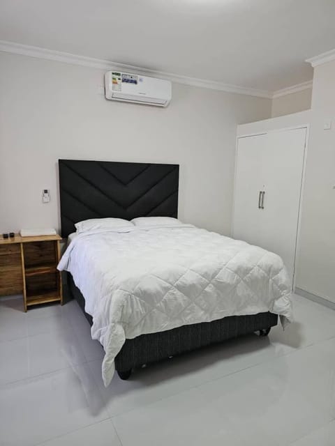 Bed, wardrobe, air conditioner